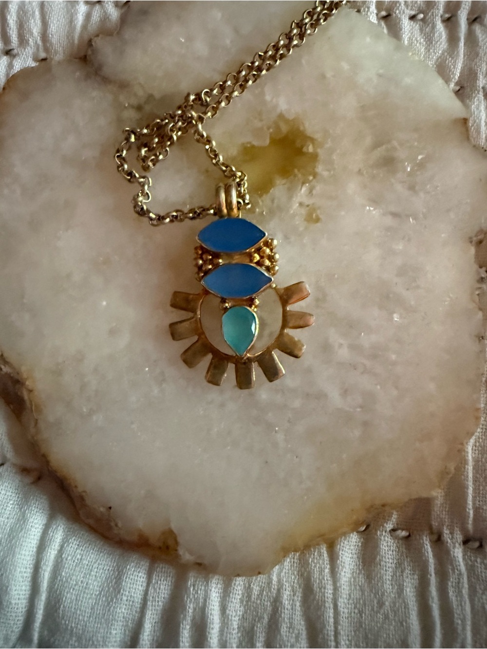 Gold-tone Blue Sunburst Pendant Necklace